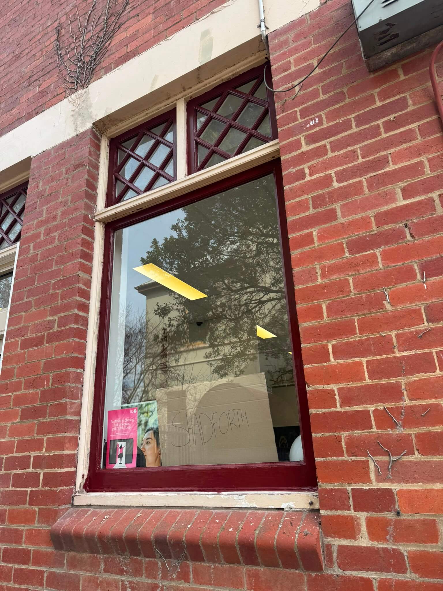Freshly painted exterior window frame at NAB Bank in Camperdown VIC